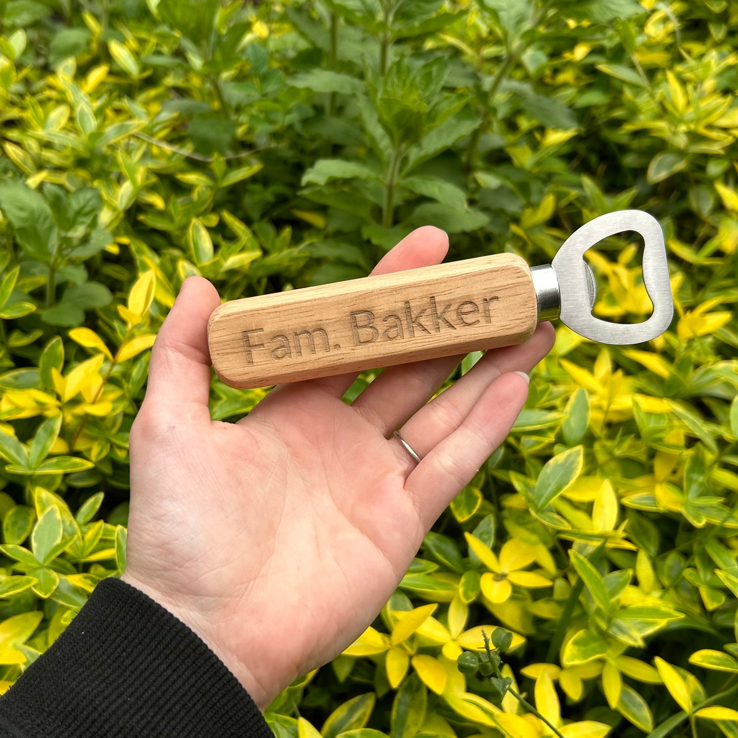 Flesopener met houten handvat