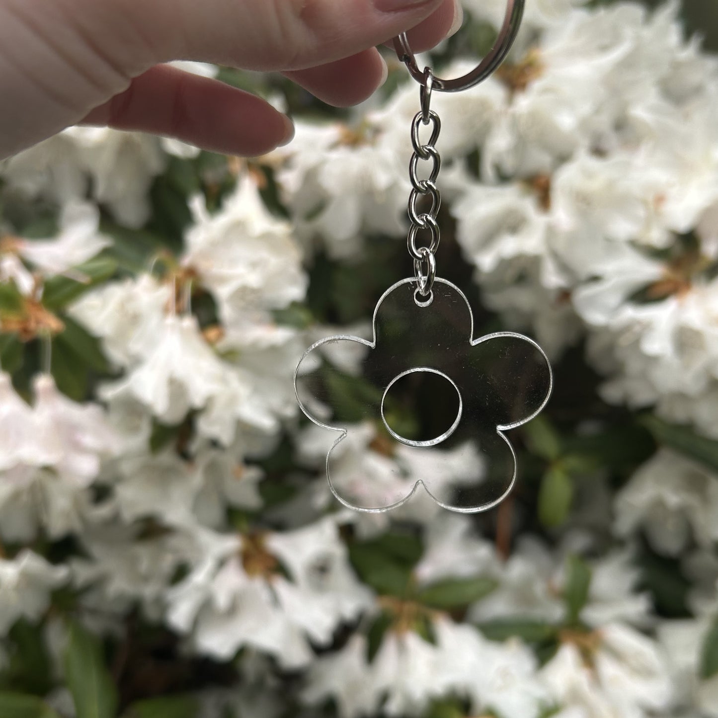 Doorzichtige bloem sleutelhanger